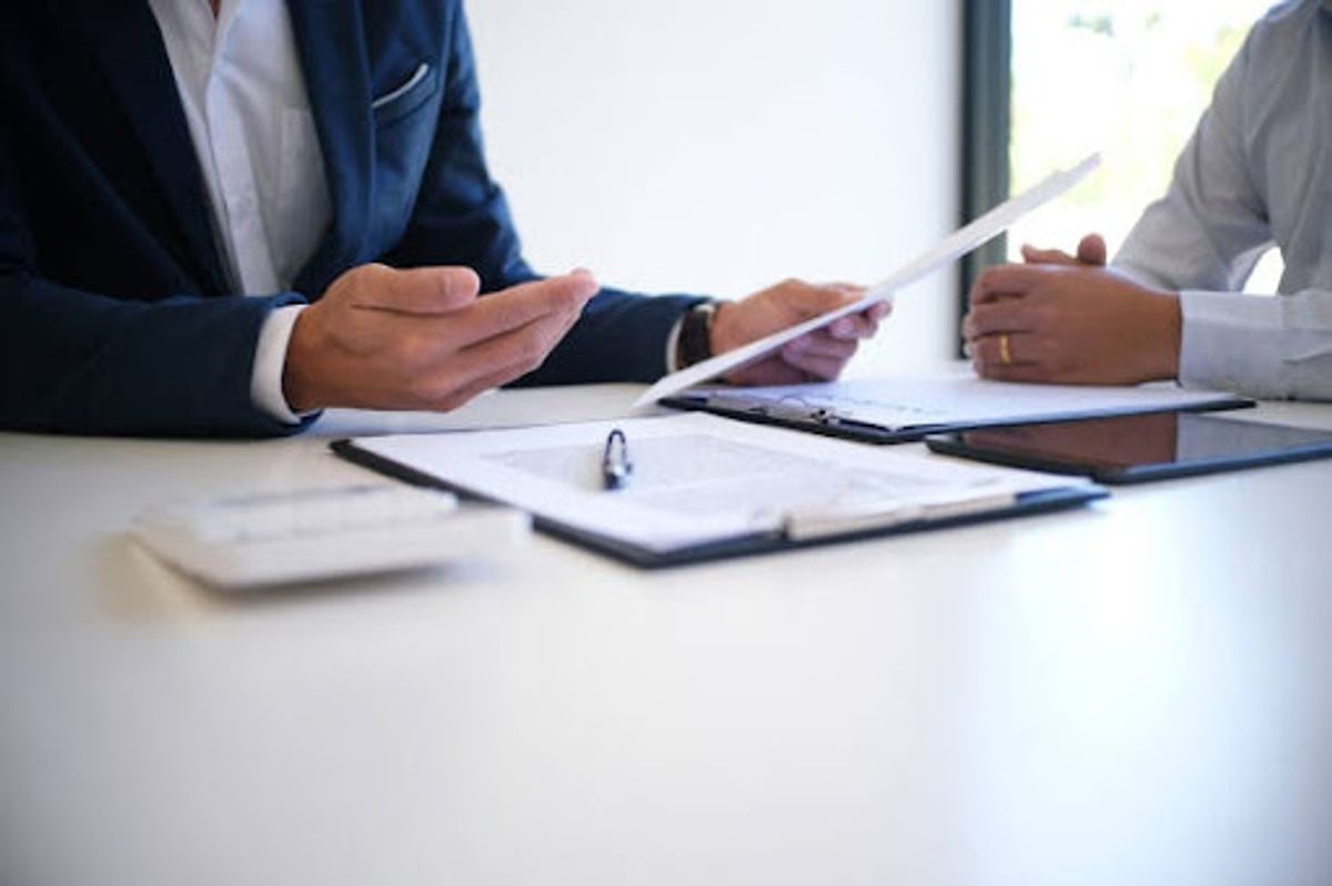 lawyer and client paperwork